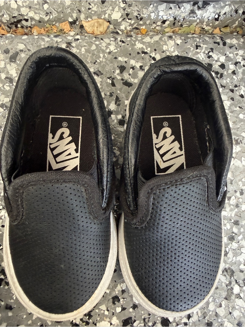 Vans Kids Black Perforated Slip-On Sneakers with White Soles